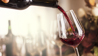 Researchers say previous findings don't account for those who abstain from alcohol because of illness. Researchers say previous findings don't account for those who abstain from alcohol because of illness.