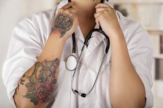 Patients do not appear to mind if doctors have tattoos or piercings. Patients do not appear to mind if doctors have tattoos or piercings.